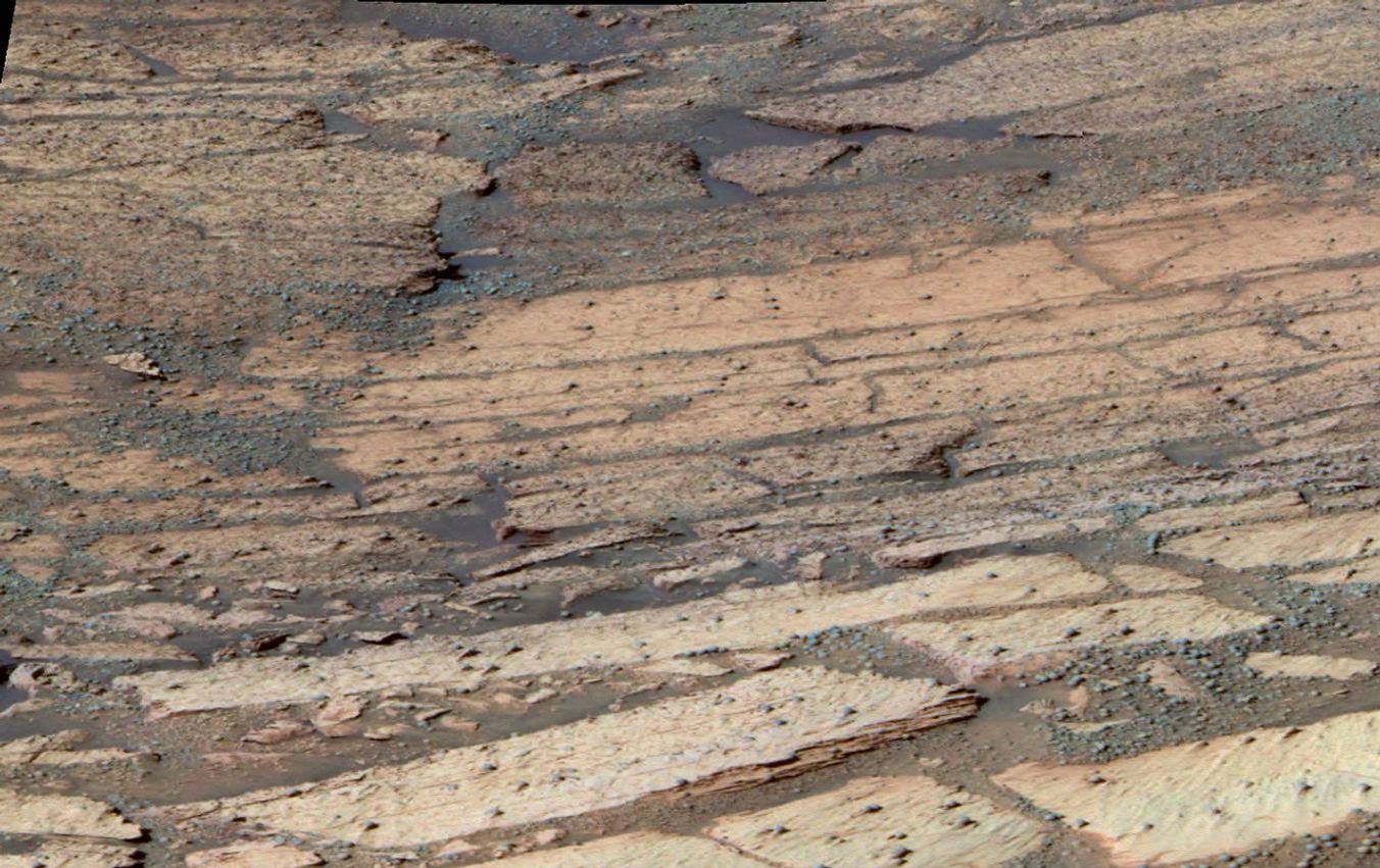 This false-color image shows the area inside 'Endurance Crater' examined by NASA's Mars Exploration Rover Opportunity. The rover is investigated the distinct layers of rock that make up this region.