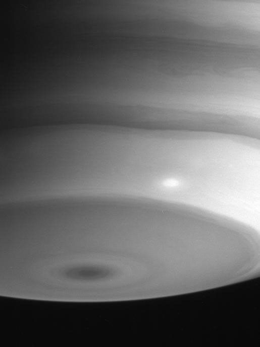 Wavy cloud bands in Saturn's atmosphere near the south pole show a great deal of delicate structure and contrast and even a bright storm in this view from NASA's Cassini spacecraft.