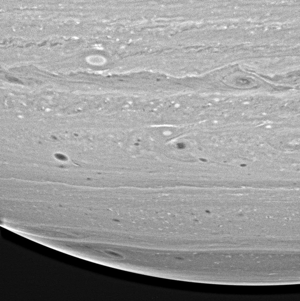 NASA's Cassini spacecraft captured this revealing view, which shows that Saturn's hydrogen- and helium-rich atmosphere is a dynamic place, filled with spots, ovals and swirling vortices and filaments of gas.