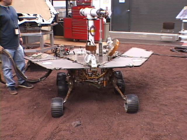 This picture shows a model of NASA's Mars Exploration Rover Spirit being tested for performance on five wheels at NASA's Jet Propulsion Laboratory.