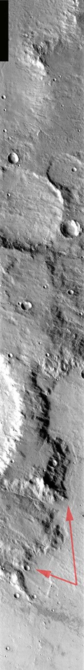 This image released on August 27, 2004 from NASA's 2001 Mars Odyssey shows Scylla Scopulus, an irregular scarp located in the southern highlands of Mars. Scolupus is a lobate of irregular scarp.