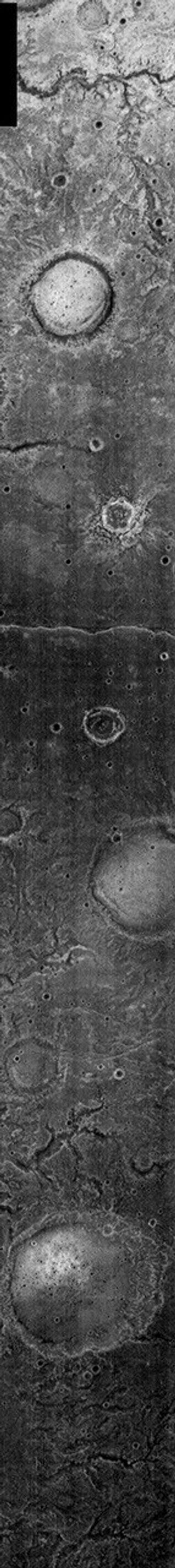 This night time image released on Nov 24, 2004 from NASA's 2001 Mars Odyssey shows a small unnamed channel on Mars located near Tyrrhena Patera. This channel is located to the northwest of the volcanic complex and likely formed by fluvial action.