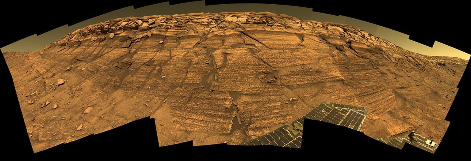 NASA's Mars Exploration Rover Opportunity captured this view in 2004 of 'Burns Cliff' after driving right to the base of this southeastern portion of the inner wall of 'Endurance Crater.'
