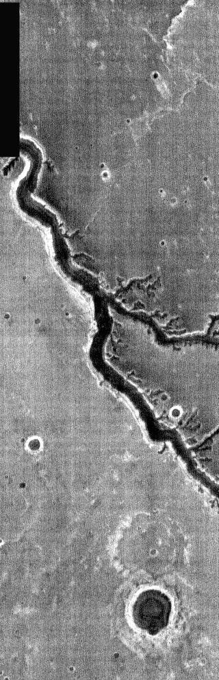 This night time image released on Nov 24, 2004 from NASA's 2001 Mars Odyssey shows Nirgal Vallis on Mars, a long fluvial channel that flows south into the margin of Argyre Basin.