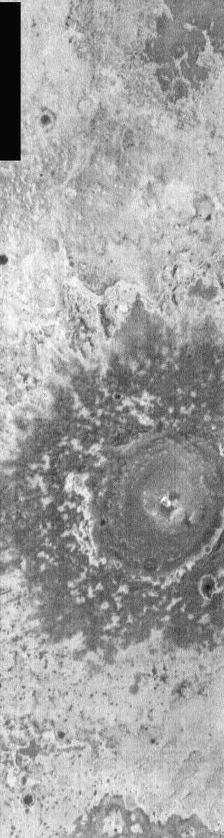 This image from NASA's Mars Odyssey shows a large crater on Mars with its ejecta emplaced in a semifluidized state, creating an outer rampart at the distal ends of the ejecta blanket. This wall can act as a trap for fine wind blown materials.