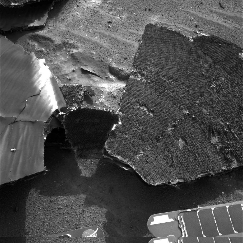 NASA's Mars Exploration Rover Opportunity used its navigation camera for this view of the flank piece of the spacecraft's heat shield on the rover's 332nd martian day, or sol (Dec. 29, 2004).