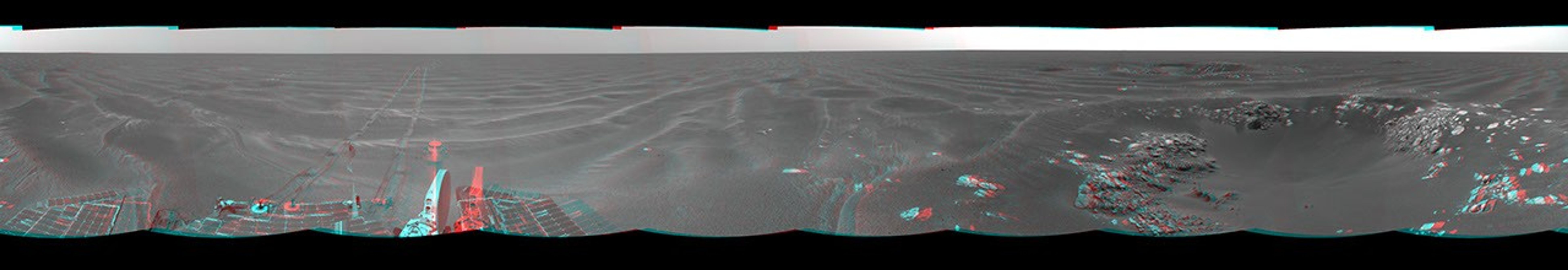 On Feb. 24, 2005, NASA's Mars Exploration Rover Opportunity had driven about 73 meters (240 feet) and reached the eastern edge of a small crater dubbed 'Naturaliste,' 3D glasses are necessary to view this image.