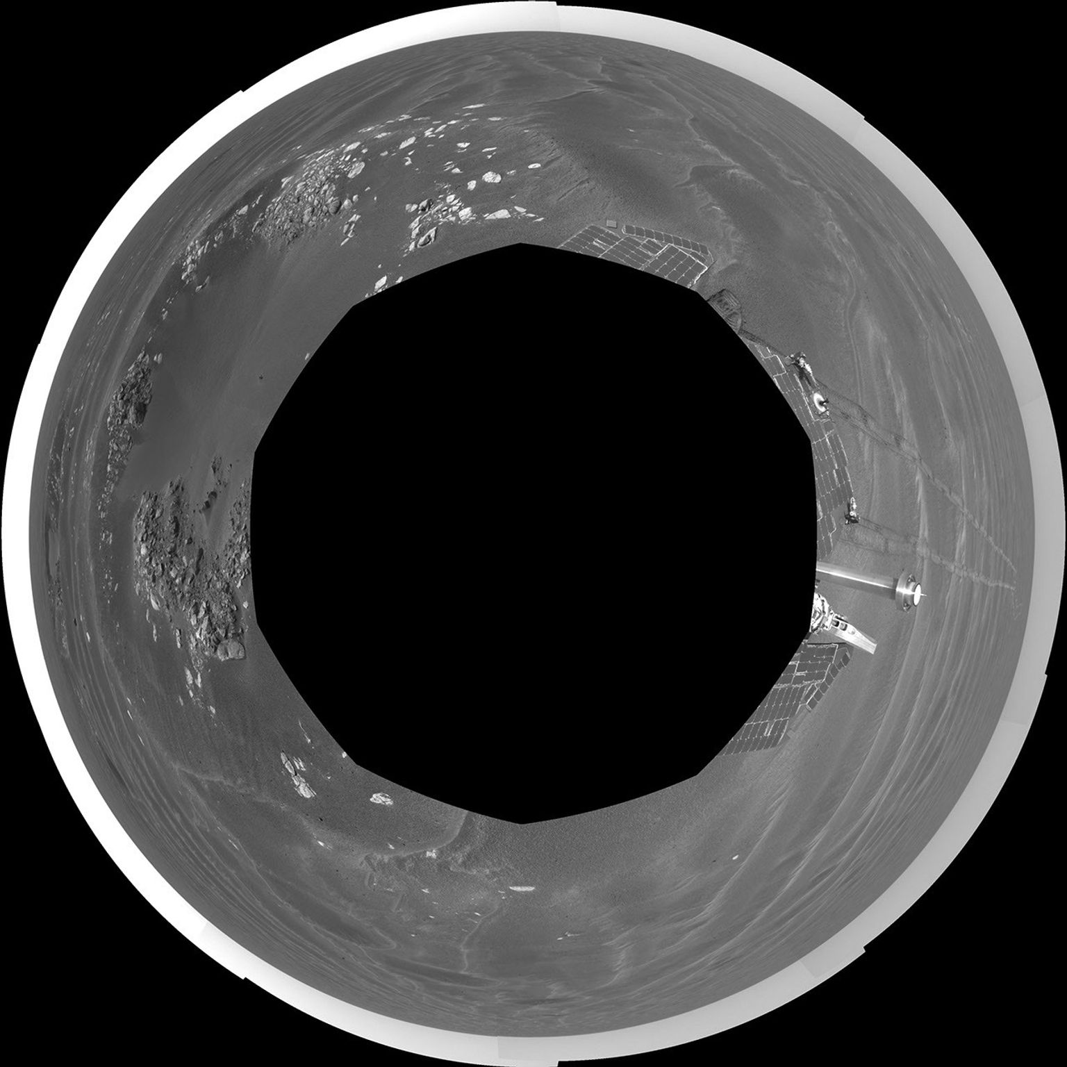 This polar projection shows NASA's Mars Exploration Rover Opportunity's view of its surroundings on Feb. 24, 2005. Opportunity had reached the eastern edge of a small crater dubbed 'Naturaliste,' seen in the right foreground.