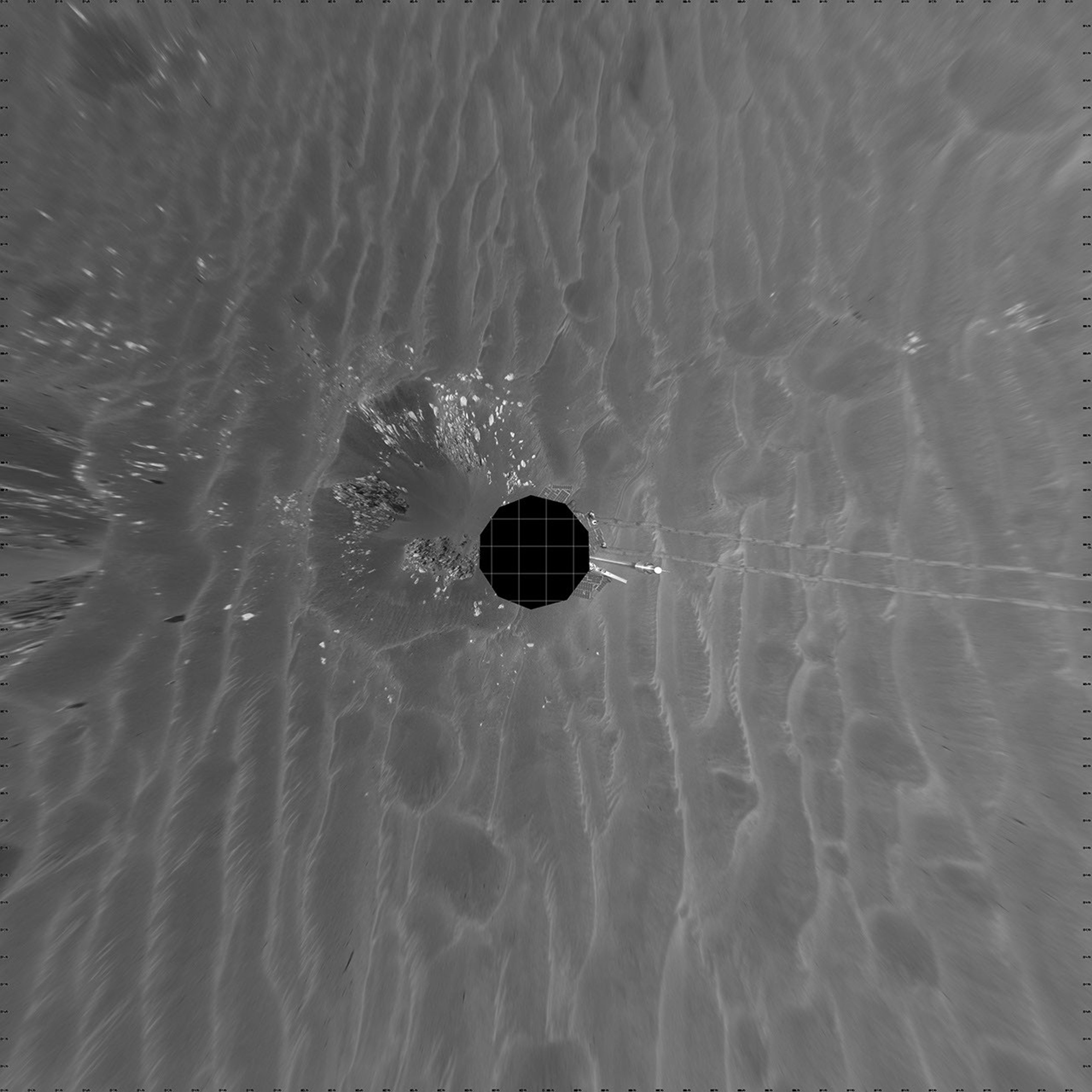 This vertical projection shows NASA's Mars Exploration Rover Opportunity's view of its surroundings on Feb. 24, 2005. Opportunity had reached the eastern edge of a small crater dubbed 'Naturaliste,' seen in the right foreground.