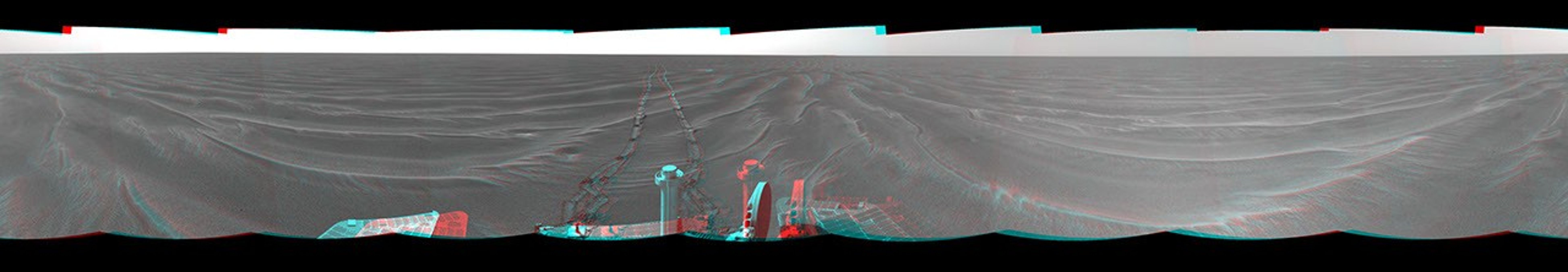 On Mar. 7, 2005, NASA's Mars Exploration Rover Opportunity drove 35 meters (115 feet) toward 'Vostok Crater' that sol before taking images. 3D glasses are necessary to view this image.