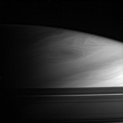 As northern winter ends on Saturn and NASA's Cassini spacecraft's view of the north pole improves, the swirls and eddies visible until now only in the south are gradually coming into view in the northern hemisphere.
