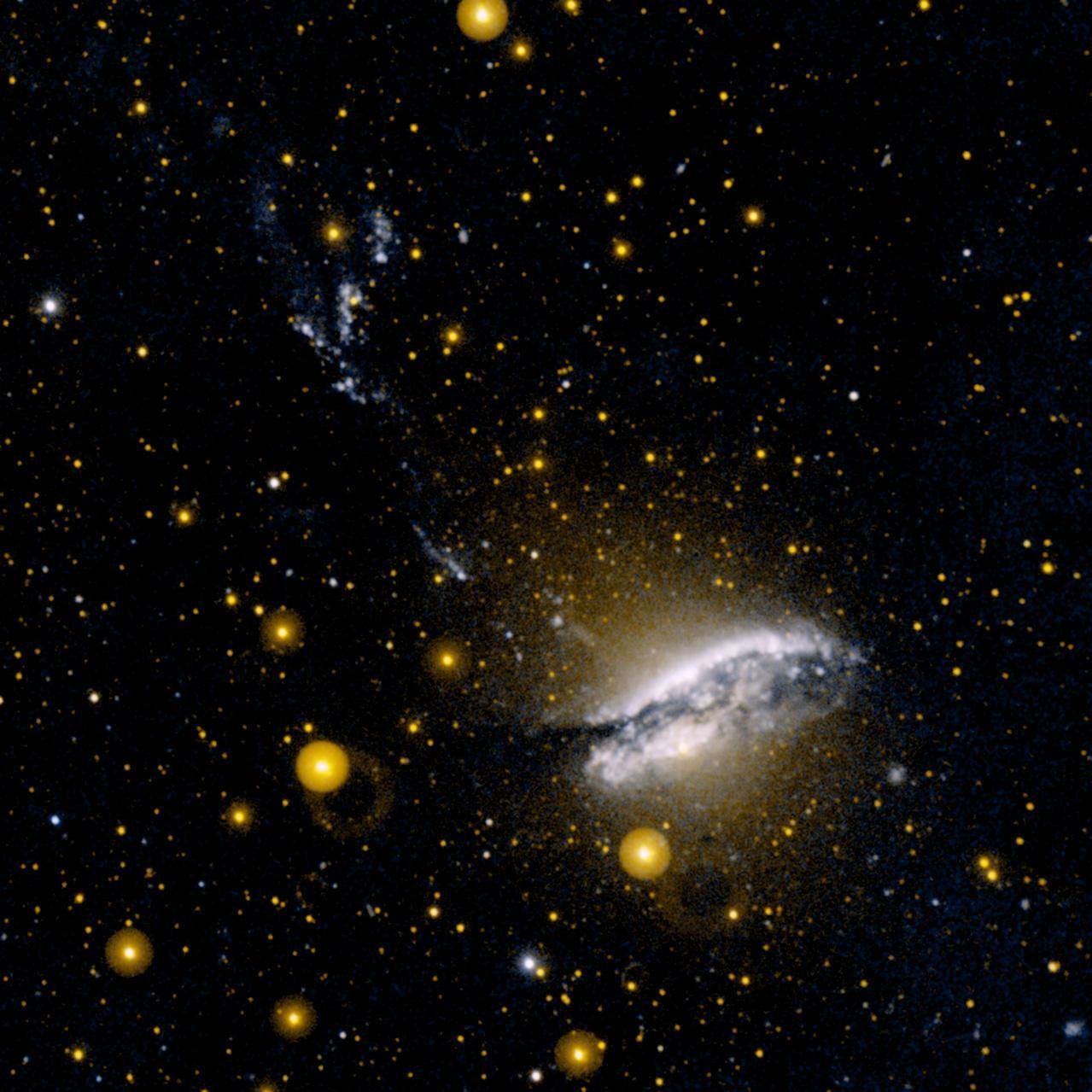 This ultraviolet image from NASA's Galaxy Evolution Explorer is of NGC 5128 (Centaurus-A). This unusual galaxy is believed to be the result of a collision of two normal galaxies.