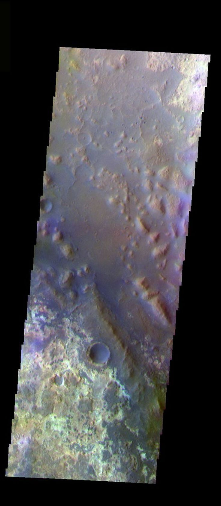 This false-color image from NASA's Mars Odyssey spacecraft shows an old channel floor and surrounding highlands located in the lower reach of Mawrth Valles on Mars.