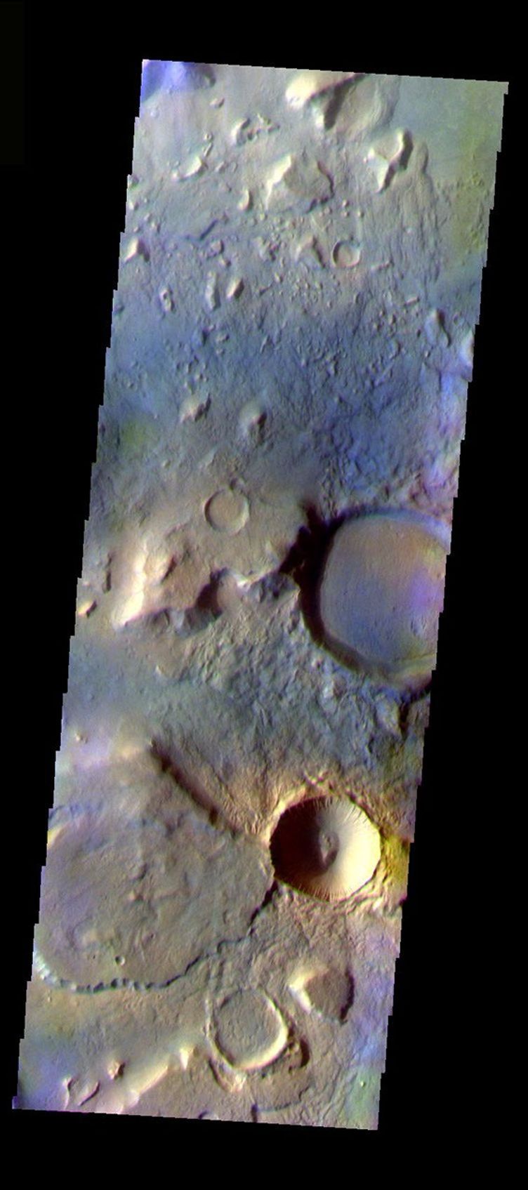 This false-color image from NASA's Mars Odyssey spacecraft shows a region with craters of different ages located at the margin of Acidalia Planitia, taken during Mars' northern spring season.