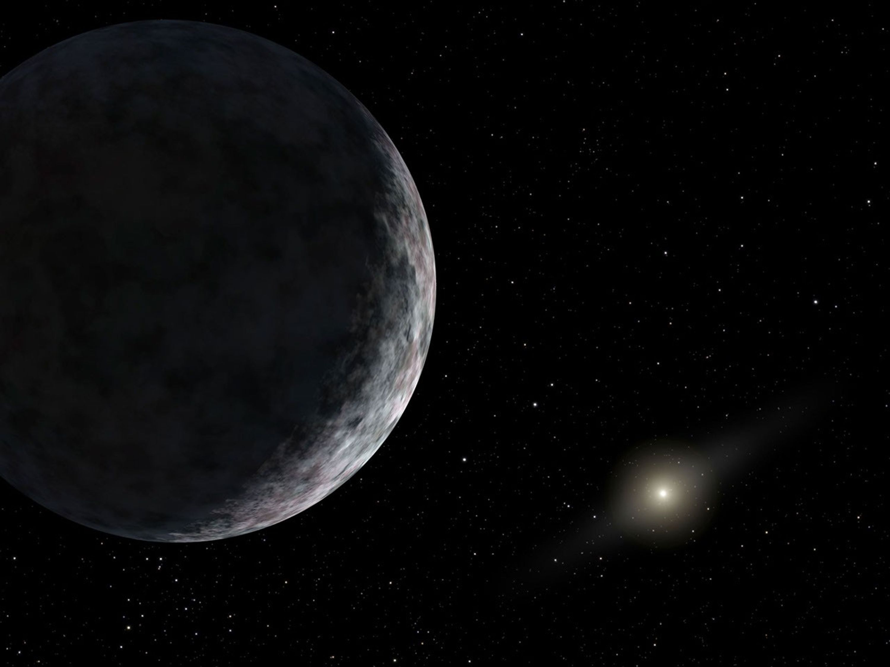 This artist's concept shows the planet catalogued as 2003UB313 at the lonely outer fringes of our solar system. Our Sun can be seen in the distance. The new planet is at least as big as Pluto and about three times farther away from the Sun than Pluto.