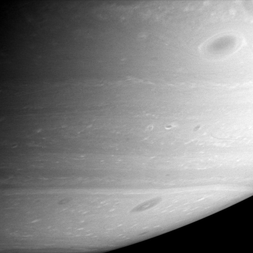 Saturn's atmosphere comes alive with a multitude of dark vortices swirling through the southern hemisphere. This image was taken with NASA's Cassini spacecraft's narrow-angle camera on Feb. 16, 2006.
