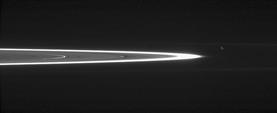 Tiny, dust-sized particles in Saturn's rings become much easier to see at high phase angle -- the angle formed by the Sun, the rings and the spacecraft. The brightest ring is the F ring as seen by NASA's Cassini spacecraft.