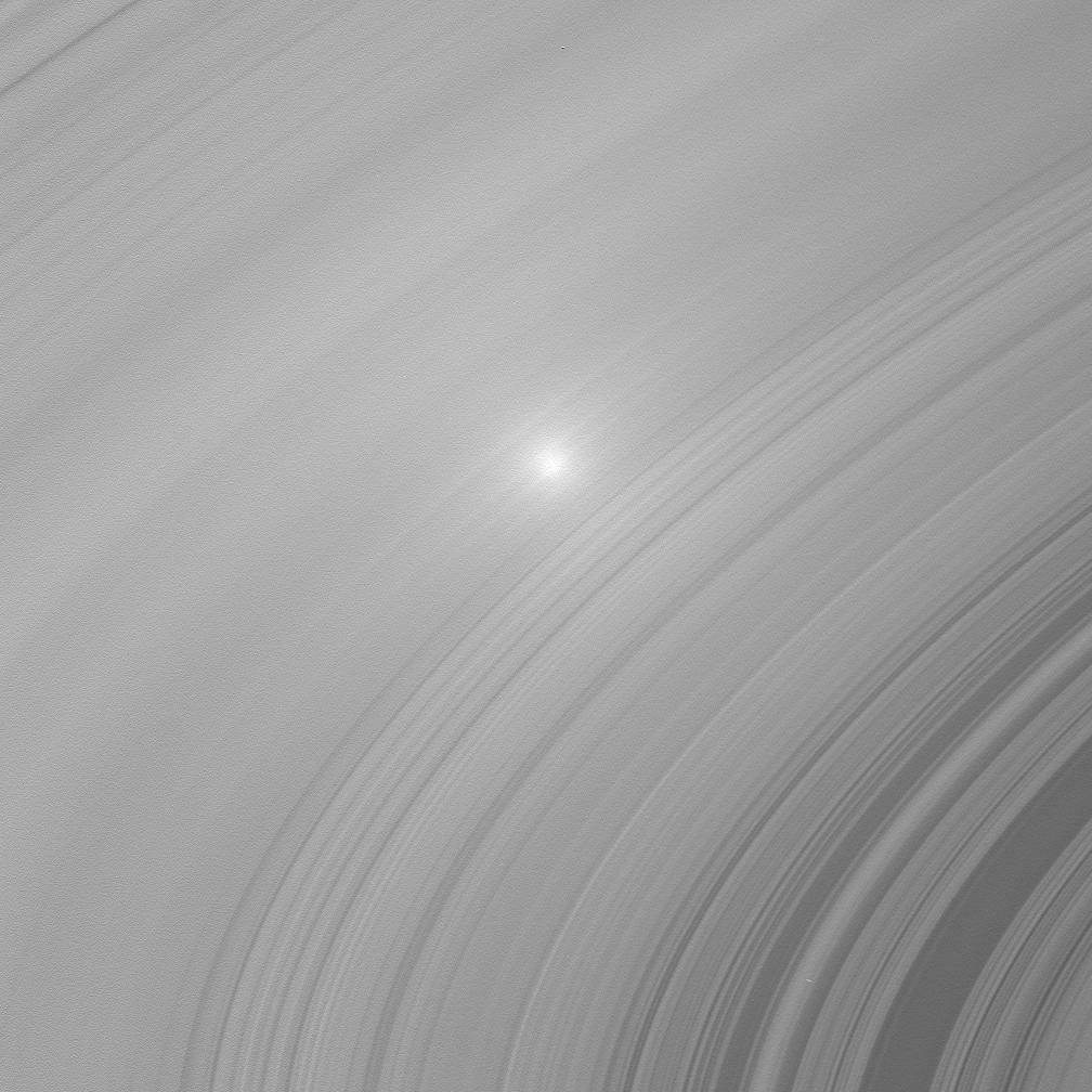Two images of Saturn's A and B ring showcase the opposition effect, a brightness surge that is visible on Saturn's rings when the Sun is directly behind NASA's Cassini spacecraft.