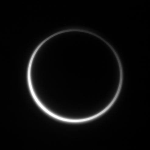 Titan's murky atmosphere shines as a halo of scattered light in this image taken by NASA's Cassini spacecraft on Aug. 10, 2006.
