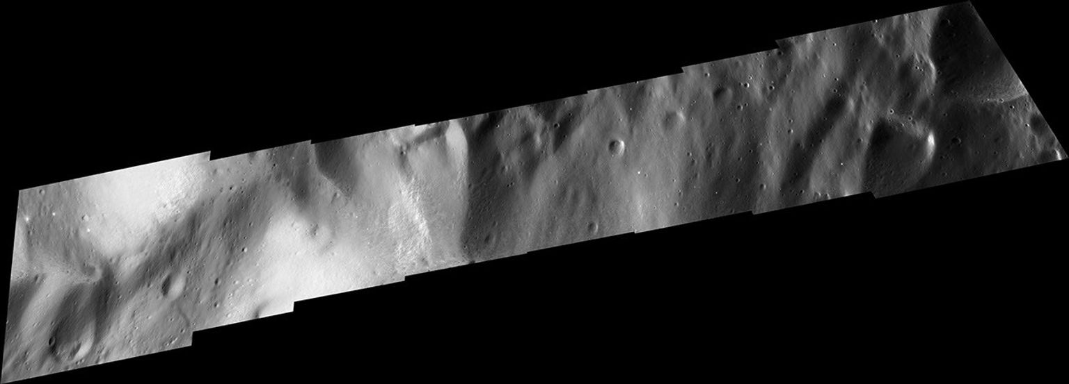 This mosaic of Cassini images shows the smallest details ever observed on Saturn's moon Iapetus. This image was taken by NASA's Cassini spacecraft on Sept. 10, 2007.
