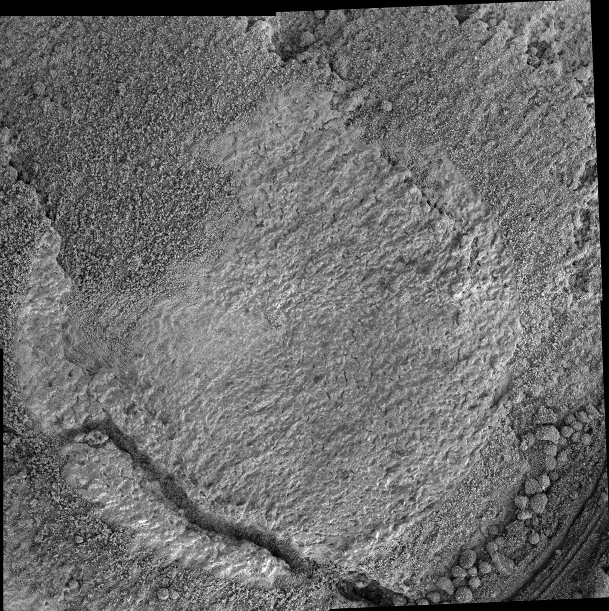 As NASA's Mars Exploration Rover Opportunity was traversing southward toward 'Victoria Crater' in May, 2006, it periodically stopping to characterize exposed bedrock, using the contact instrument suite on the robotic arm.