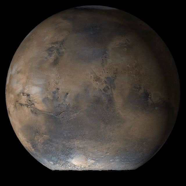 NASA's Mars Global Surveyor shows the Acidalia/Mare Erythraeum face of Mars at Ls 66° in mid-June 2006.