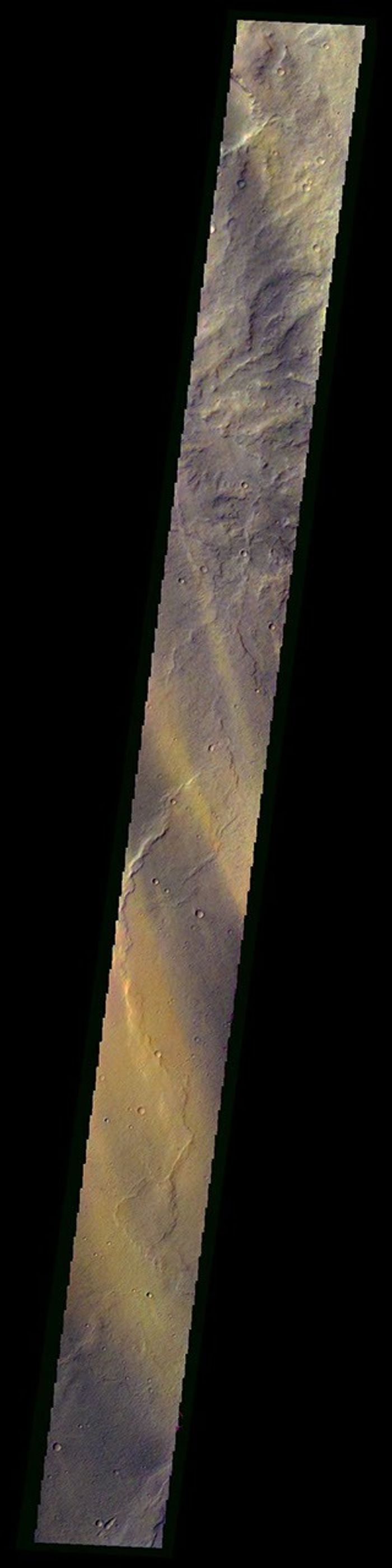 This image from NASA's Mars Odyssey spacecraft shows true-color of a banded Martian landscape.