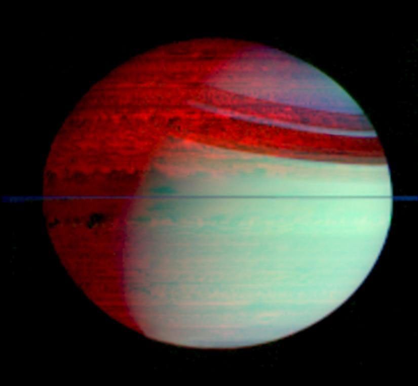 This false-color mosaic of Saturn shows deep-level clouds silhouetted against Saturn's glowing interior. This image was made with data from NASA's Cassini visual and infrared mapping spectrometer.
