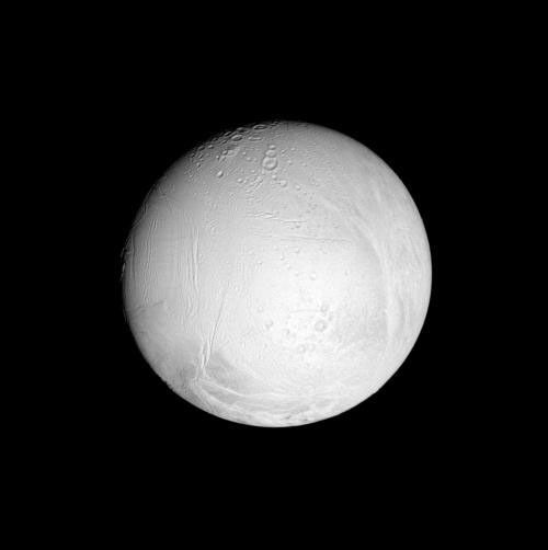 This nearly equatorial view shows cratered regions on Enceladus in the central part of its leading hemisphere and high northern latitudes. This image was taken in polarized green light with NASA's Cassini spacecraft's narrow-angle camera.