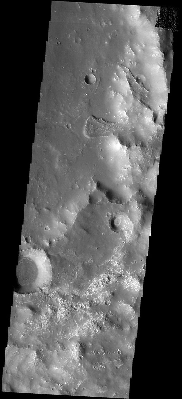 This image from NASA's Mars Odyssey spacecraft shows two landslides occurring along the margin of Solis Planum.