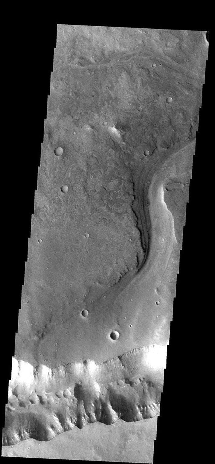 This image from NASA's Mars Odyssey spacecraft shows where Mars' Allegheny Vallis intersects Ophir Cavus (the canyon at the bottom of the frame).