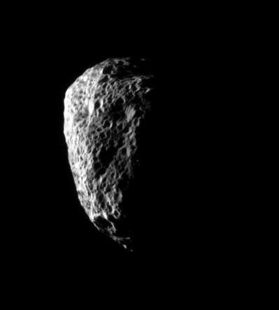 Saturn's irregularly shaped moon Hyperion is completely covered with large pits from which much of its material has been blasted by impacts, never to return. This image was captured by NASA's Cassini spacecraft on Oct. 21, 2007.