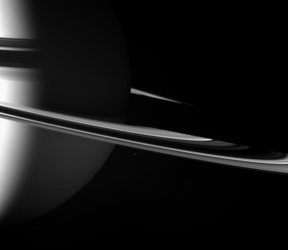 A small moon travels its circuit just outside the main rings of Saturn. Epimetheus is absolutely dwarfed by the giant planet.This image was captured by NASA's Cassini spacecraft on Nov. 14, 2007.