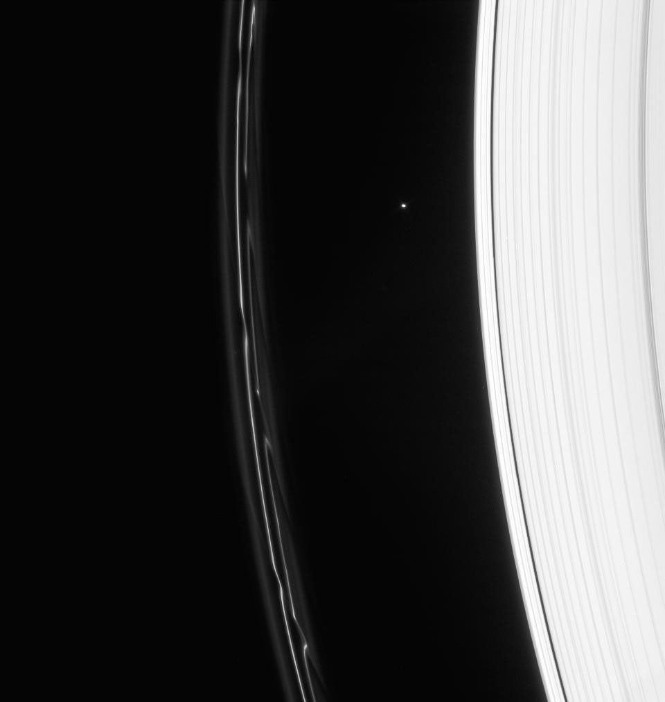 Saturn's F ring displays magnificent structure following the passage of Prometheus. Atlas is seen between the A and F rings, above center in this image captured by NASA's Cassini spacecraft on Jan. 23, 2008.