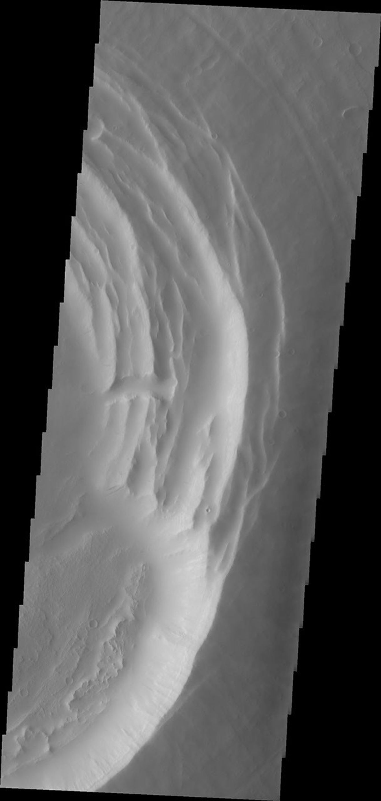 This image from NASA's Mars Odyssey spacecraft shows the summit of Biblis Patera on Mars.