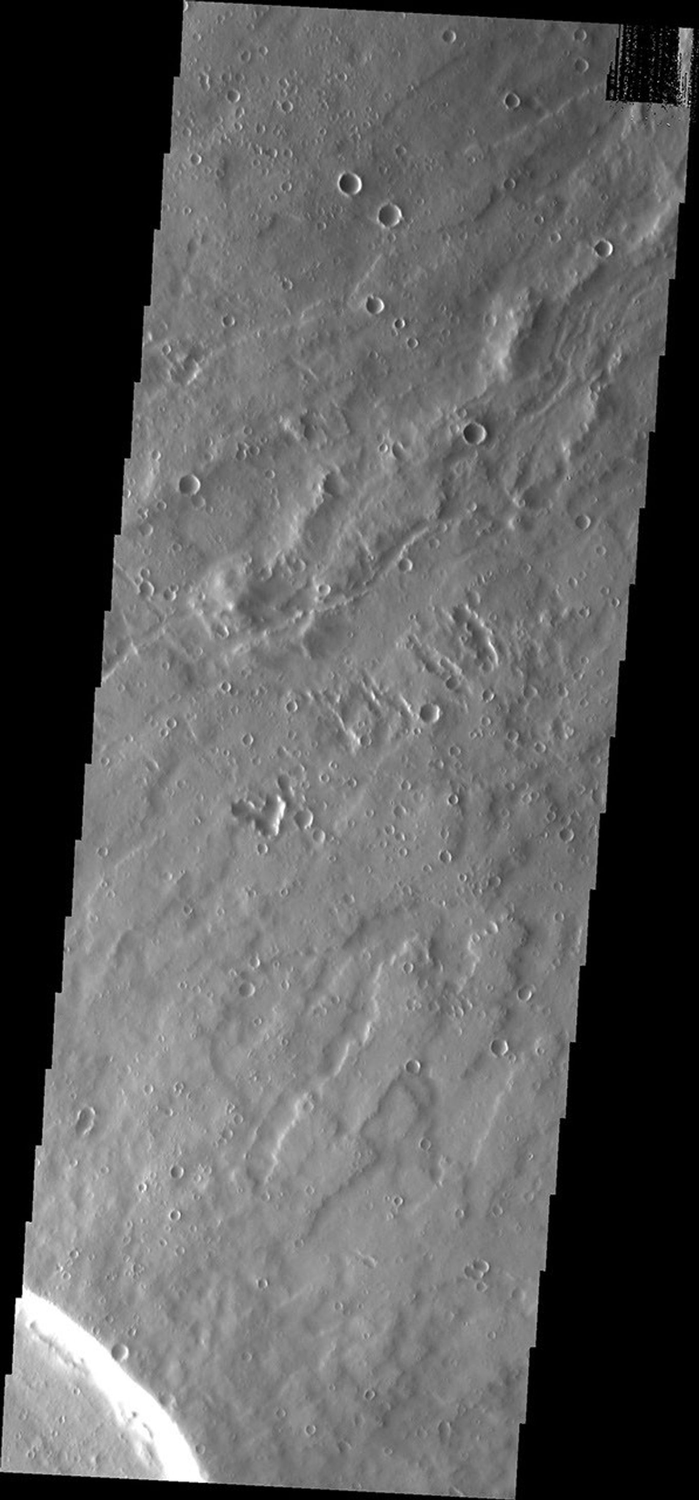 This image from NASA's Mars Odyssey spacecraft shows a small part of the summit caldera of Uranius Patera on Mars.