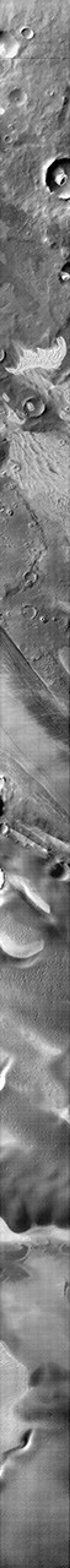 This image from NASA's Mars Odyssey spacecraft shows Terra Cimmeria containing dune fields located both on the floor of craters and on the plains between craters