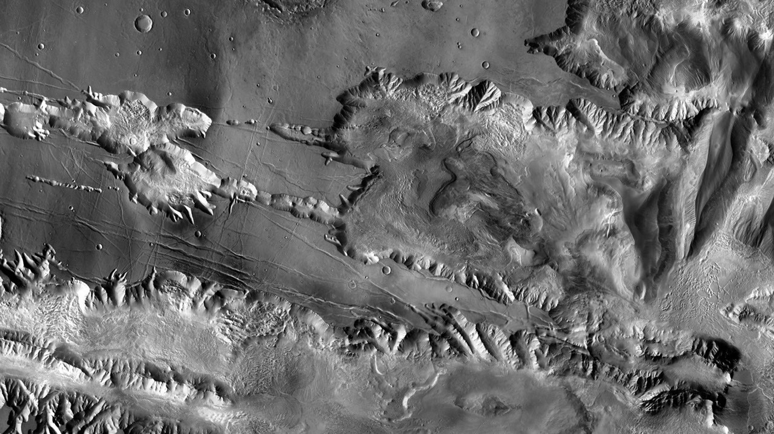 This image from NASA's Mars Odyssey spacecraft shows the southwestern portion of Mars's Candor Chasma, part of the large canyon system named Valles Marineris on Mars.