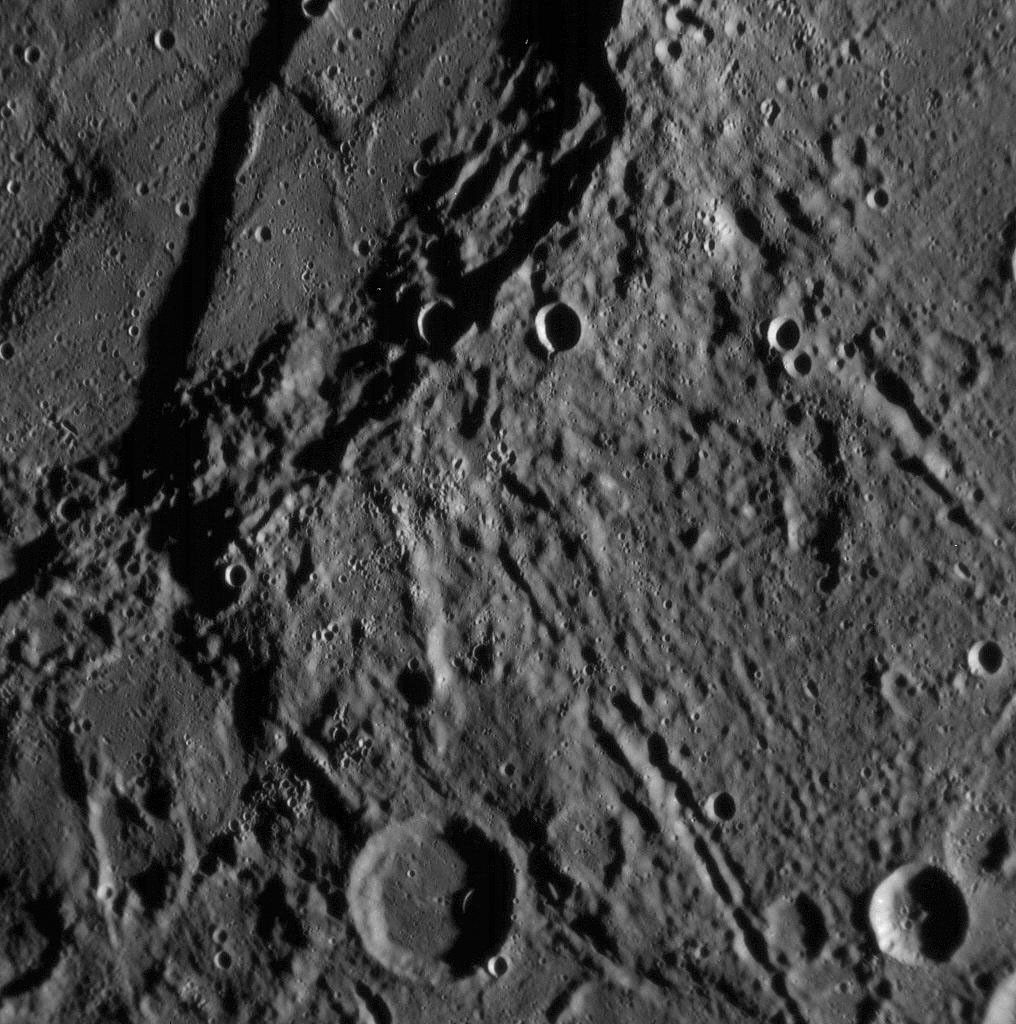 Just 21 minutes after NASA's MESSENGER spacecraft's closest approach to Mercury, the Narrow Angle Camera (NAC) took this picture showing a variety of intriguing surface features, including craters as small as about 400 meters (about 400 yards) across.