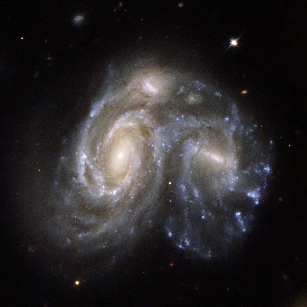 Collision Between Two Spiral Galaxies - NASA Science