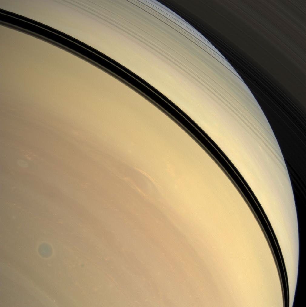 Rendered in myriad hues, vivid details of Saturn's stormy atmosphere play out below the shadow of the rings in this image from NASA's Cassini spacecraft taken on Dec. 29, 2008.