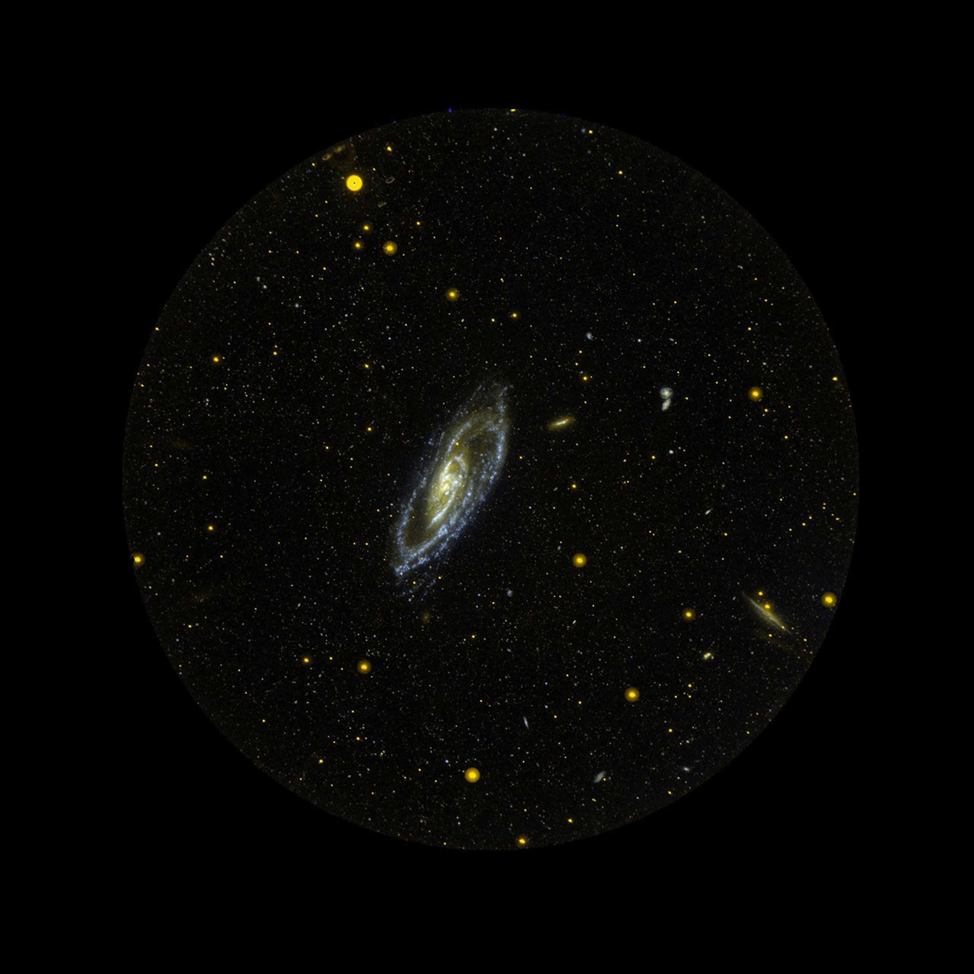 Since its launch five years ago, the Galaxy Evolution Explorer has photographed hundreds of millions of galaxies in ultraviolet light. M106 is one of those galaxies, 22 light years away.