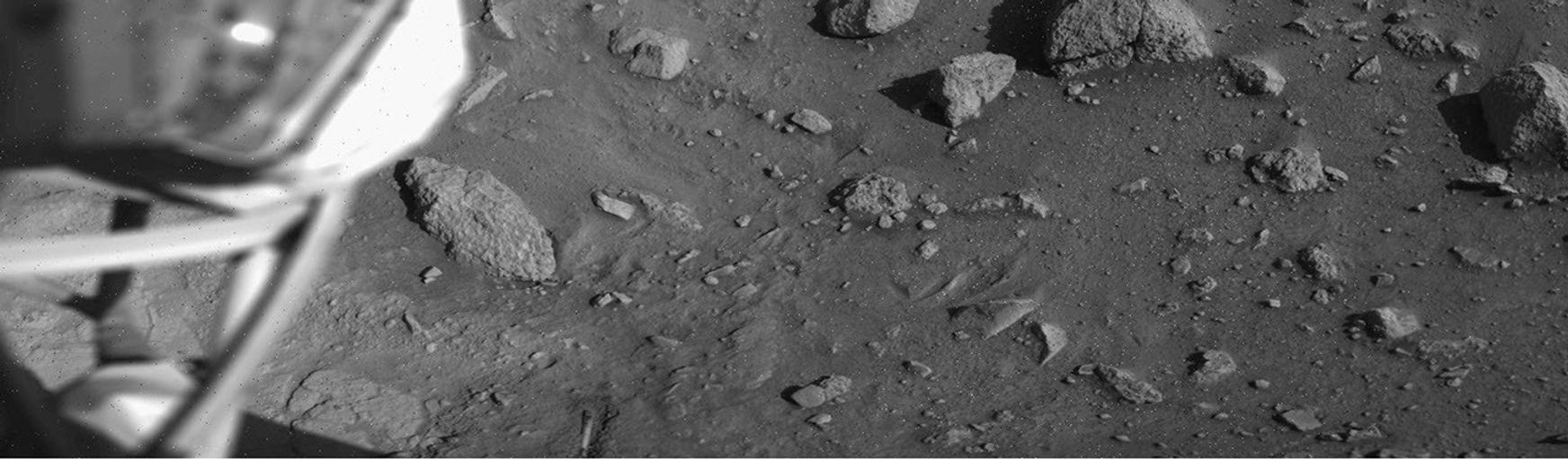 This image was taken by NASA's Viking Lander 1 on August 1, 1976, 12 sols after landing. The soil beneath Viking 1 has been exposed due to exhaust from thruster engines during descent.