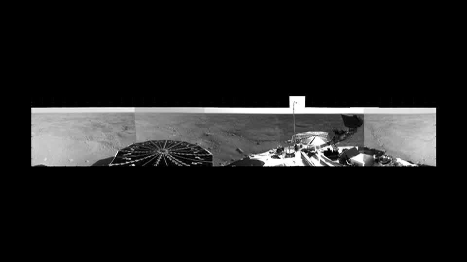 This from NASA's Phoenix Mars Lander's Stereo Surface Imager (SSI) camera shows Phoenix's parachute, backshell, heatshield, and impact site.