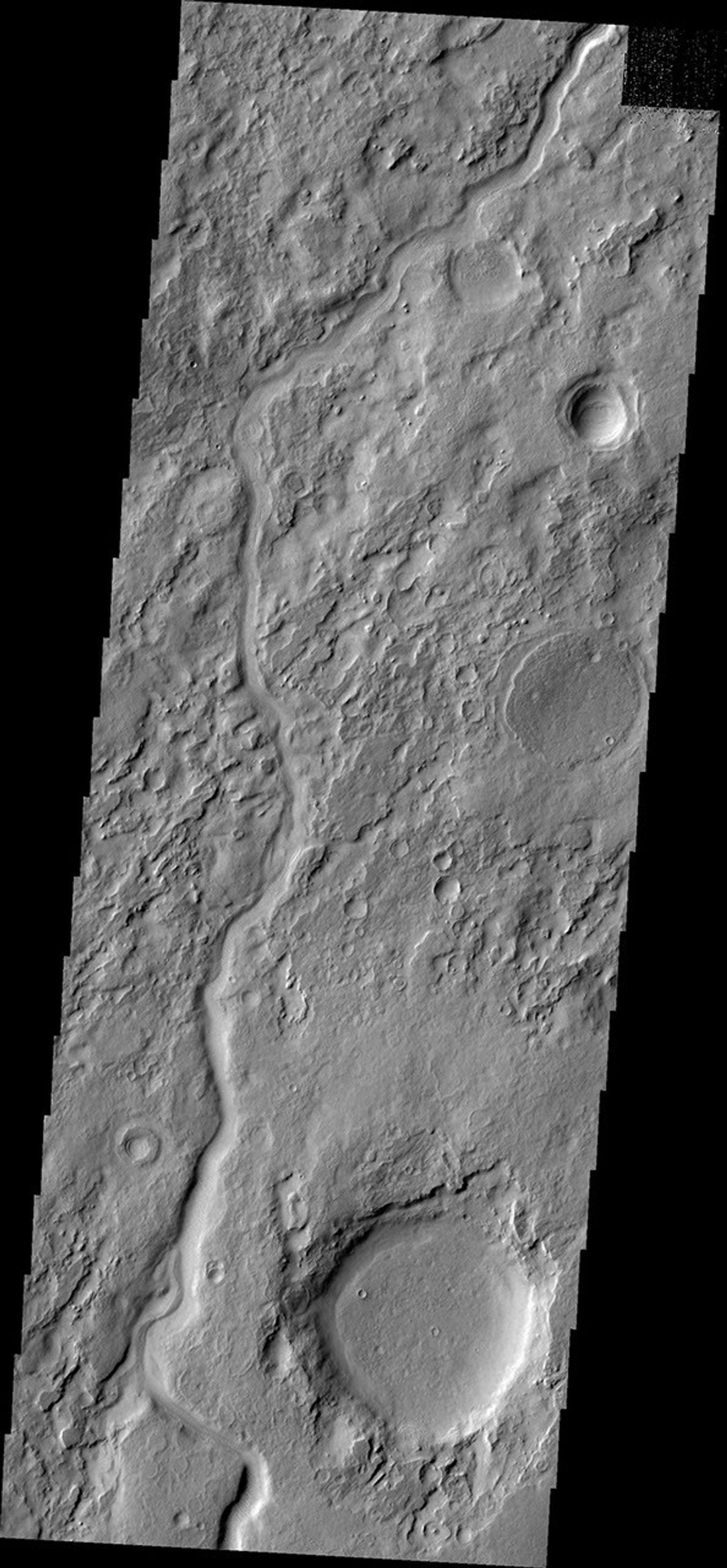 This image from NASA's Mars Odyssey shows a portion of Auqakuh Vallis on Mars.