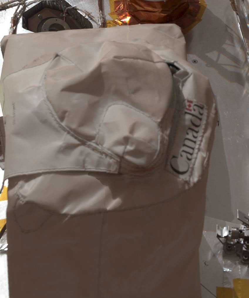 This color mosaic image of the protective cover of the lidar onboard NASA's Phoenix Mars Lander was taken by the Surface Stereo Imager (SSI) on Sol 35, or the 35th day of the mission, June 30, 2008. The lidar is part of the Canadian-built weather station.