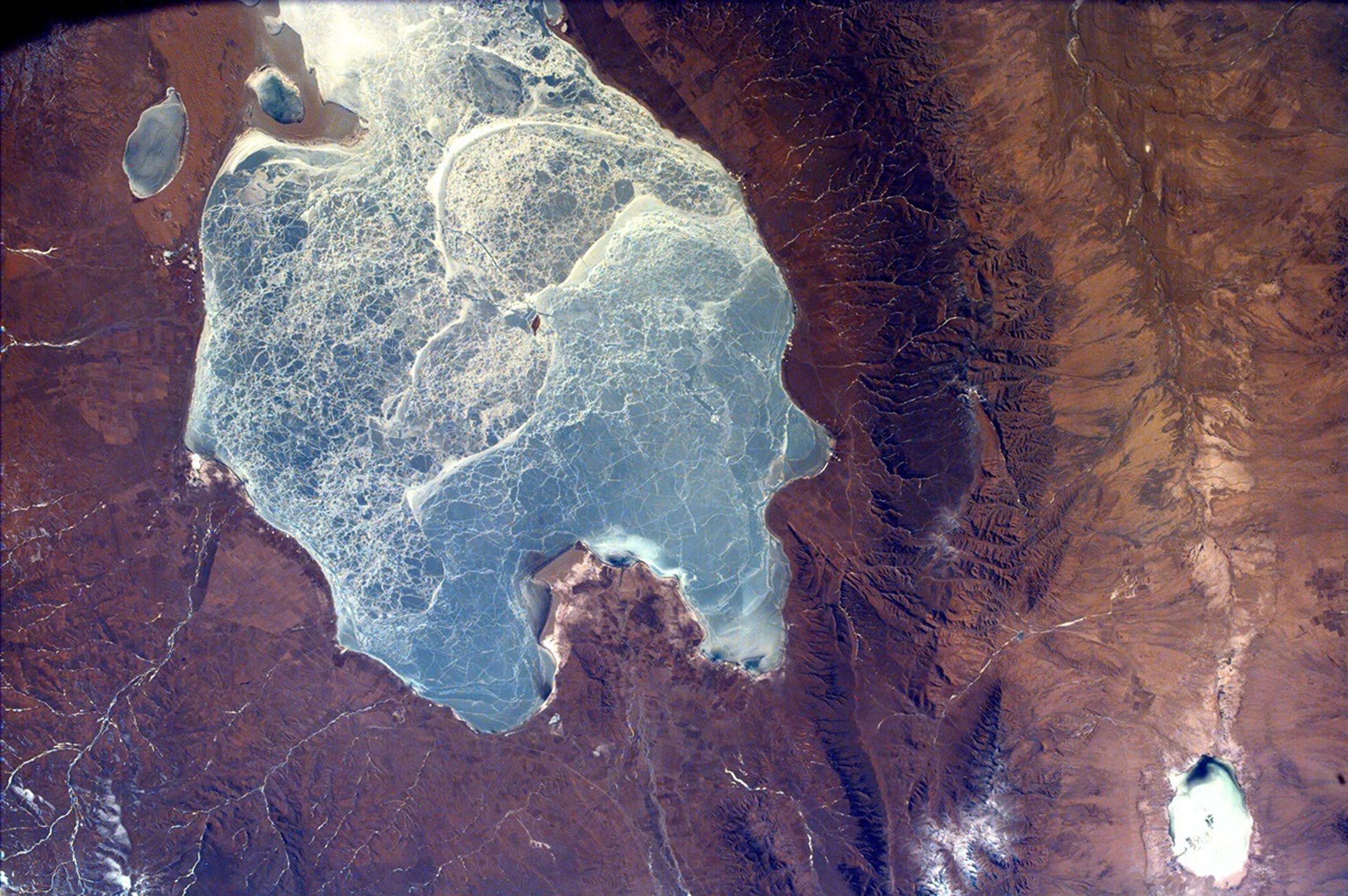 This image from NASA's EarthKAM captures almost all of Quinghai, the largest lake in China. It is located in the Quinghai Province on the Quinghai Tibetan Plateau.