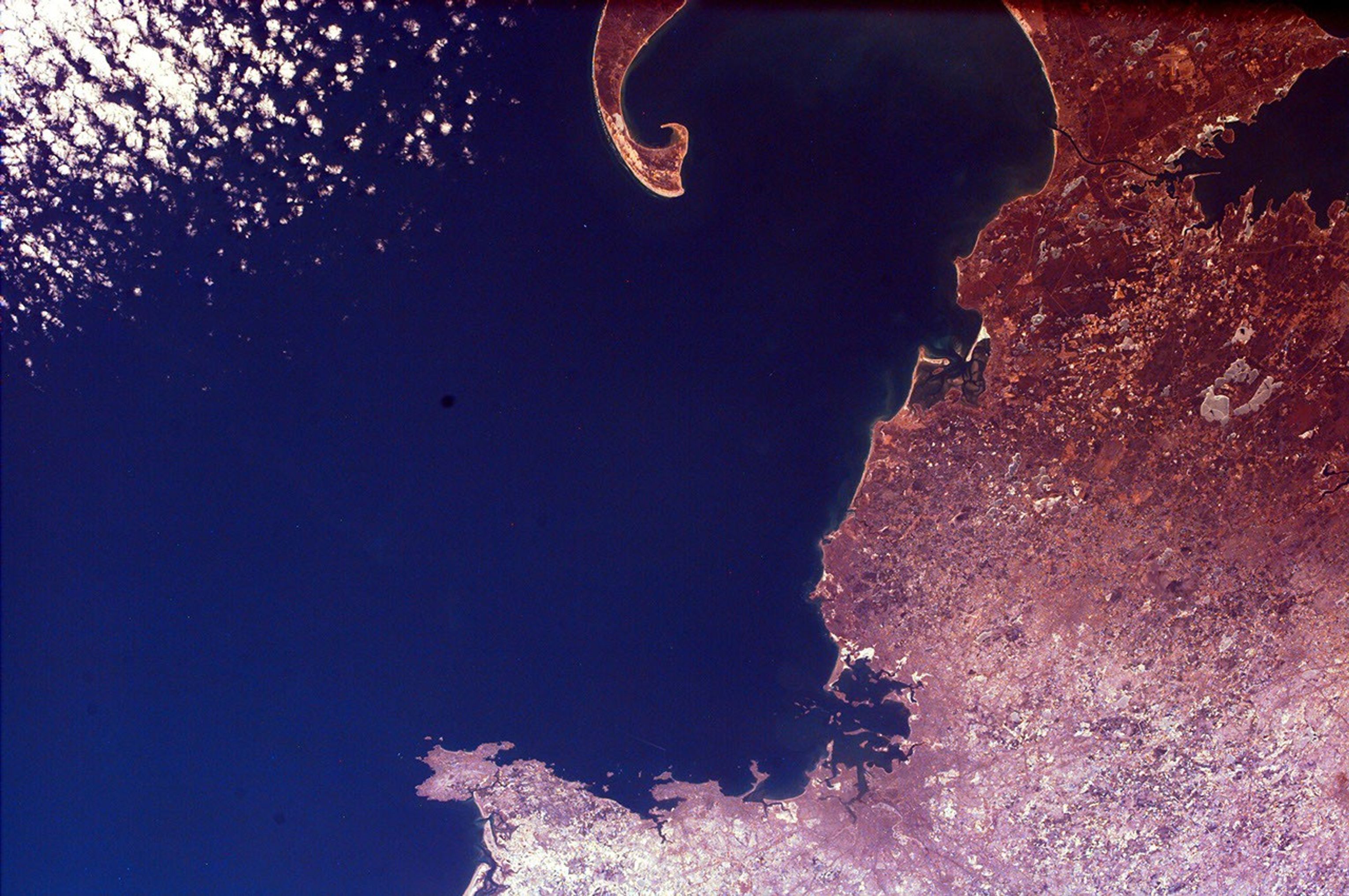 The distinctive curve of Cape Cod, Massachusetts and the greater Boston urban area are very clear of the northeastern coast of the United States in this image from NASA's EarthKAM.