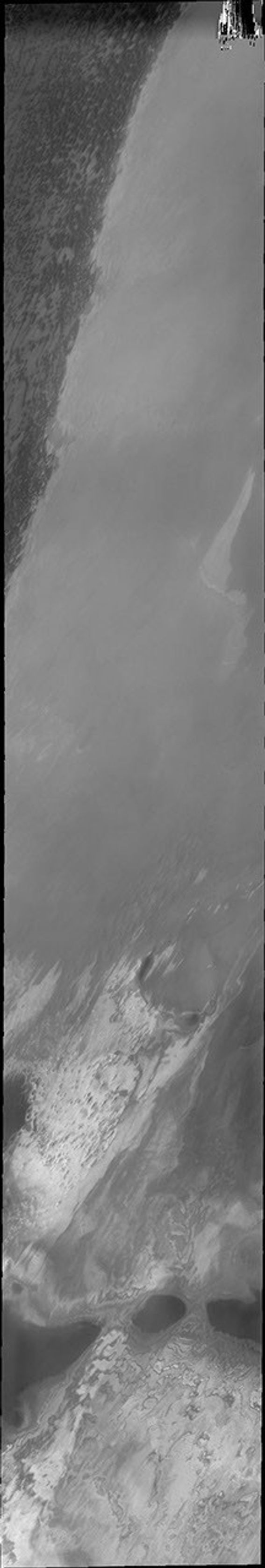 This image from NASA's Mars Odyssey shows Mars' polar dunes and a large region just off the permanent polar cap.