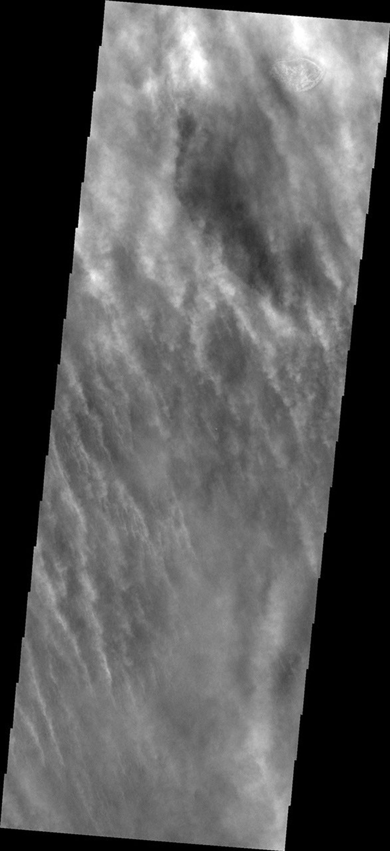 This image from NASA's Mars Odyssey shows a dust storm in action during the southern springtime on Mars.